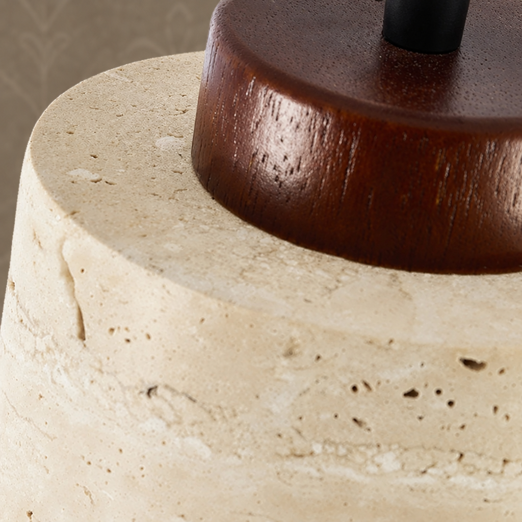 Close-up of travertine shade with dark wooden cap