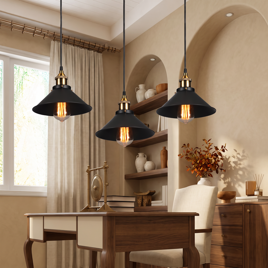 Three black and brass industrial cone pendant lights in a warm beige study with a walnut desk